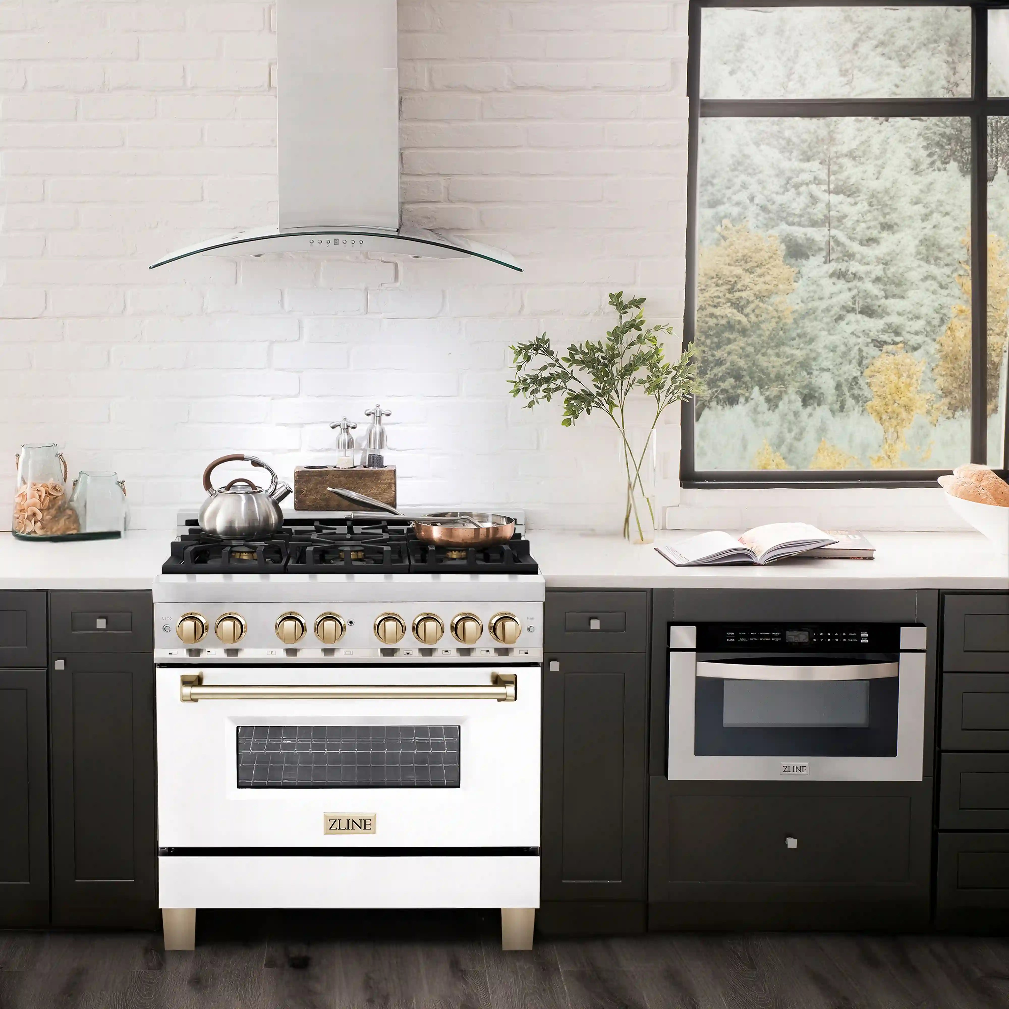 Stainless range in white with gold accents and black cooktop grates