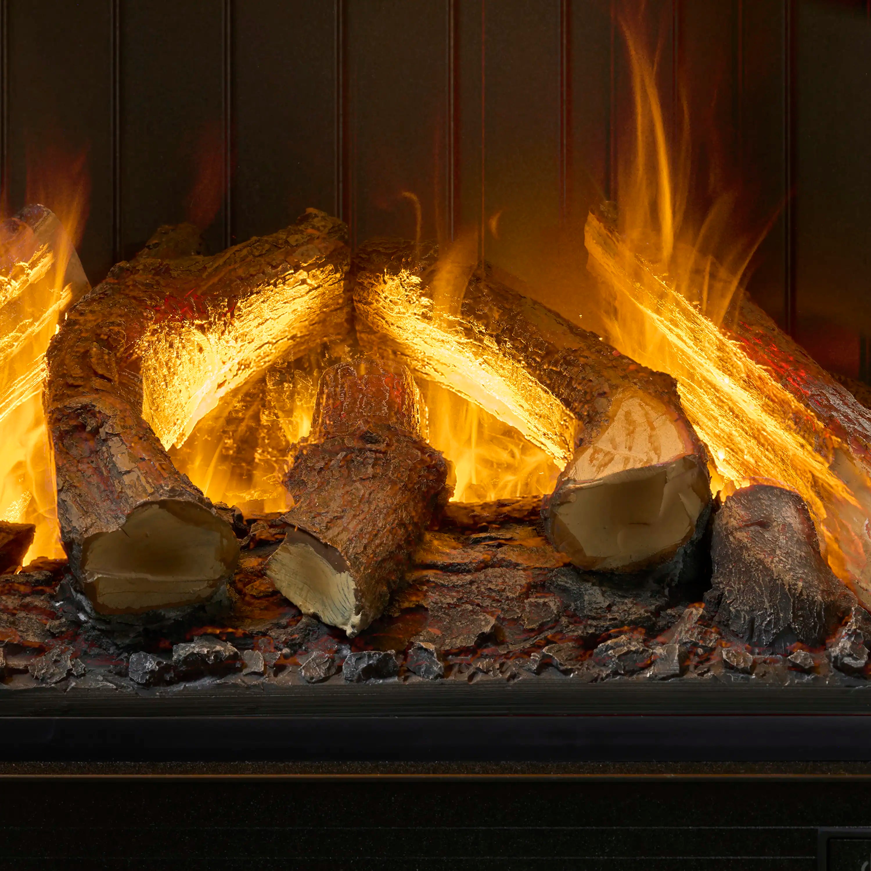 Water vapor fireplace flame and glowing logs with glowing ember bed behind glass.