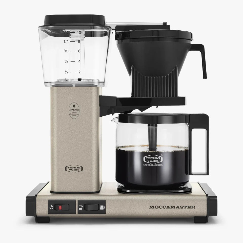 Sandstone 10-cup drip coffee maker with glass carafe and black funnel cover