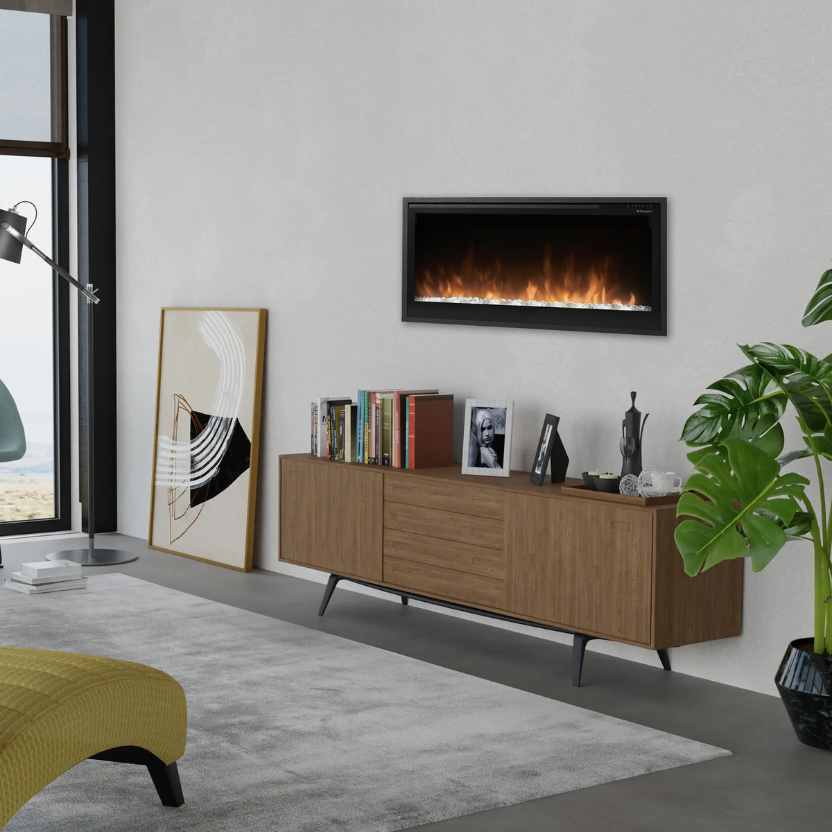 Slim linear built-in electric fireplace with black frame and glowing flame window