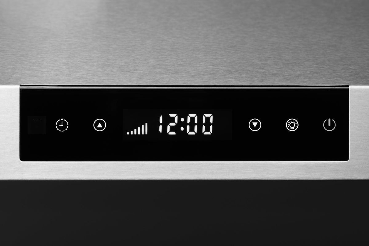 Stainless steel range hood control panel with digital 12:00 display and icon buttons.