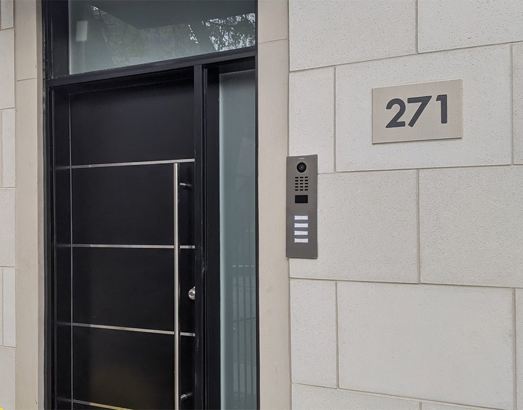DoorBird IP video door station in brass finish with camera, 4 call buttons, label 271