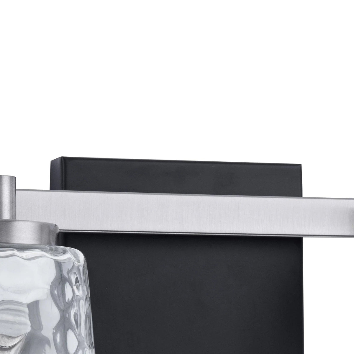 Black vanity light backplate with brushed metal side rails and clear glass shade