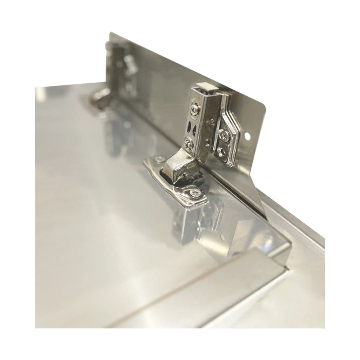 Cabinet hinge mechanism with soft-close hardware, close-up on metal brackets