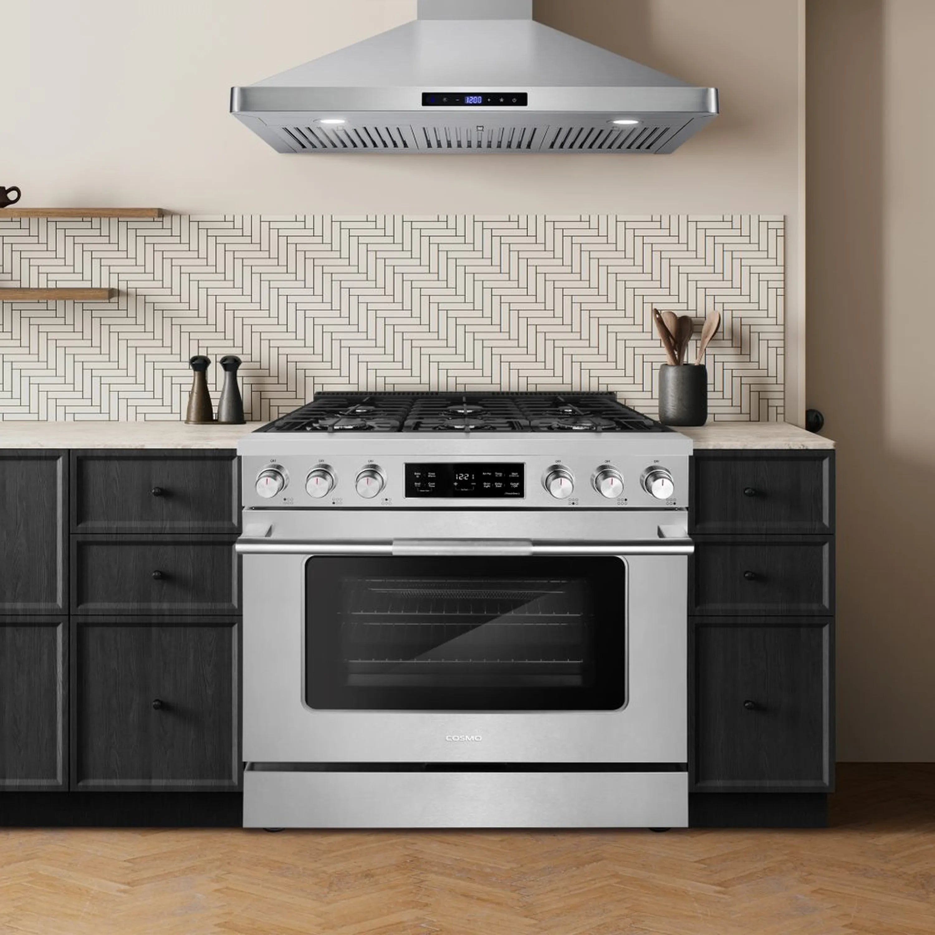Stainless steel gas range in a kitchen setting with open oven door and burners