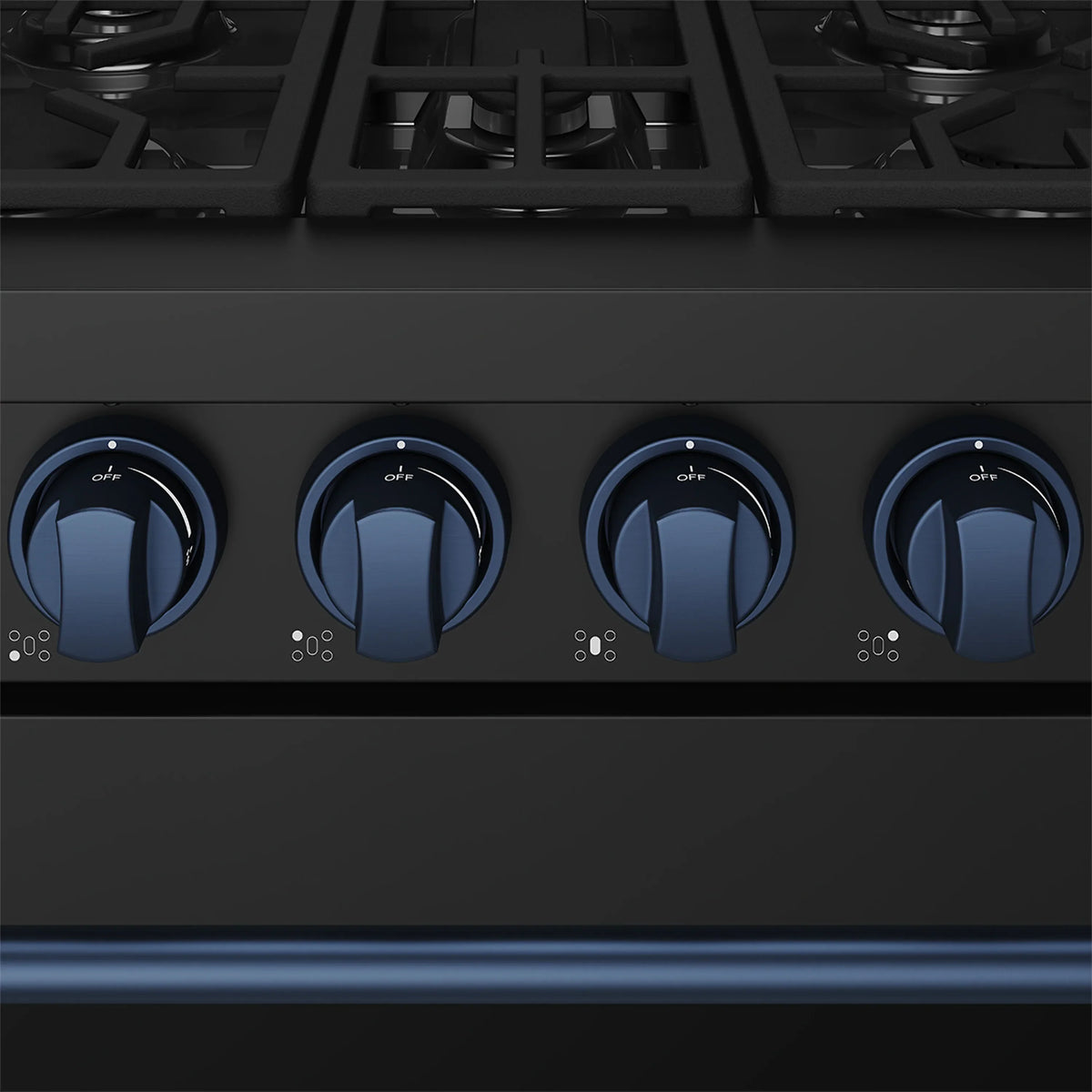 Close-up of black propane gas range control knobs with blue accents.