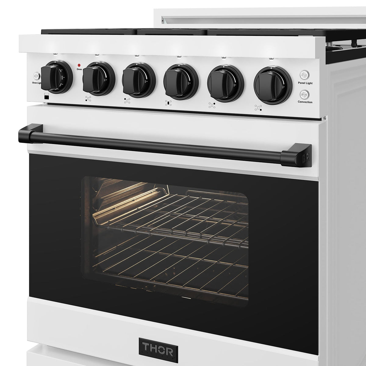 White 30-inch professional gas range with black hardware, close-up of the oven door