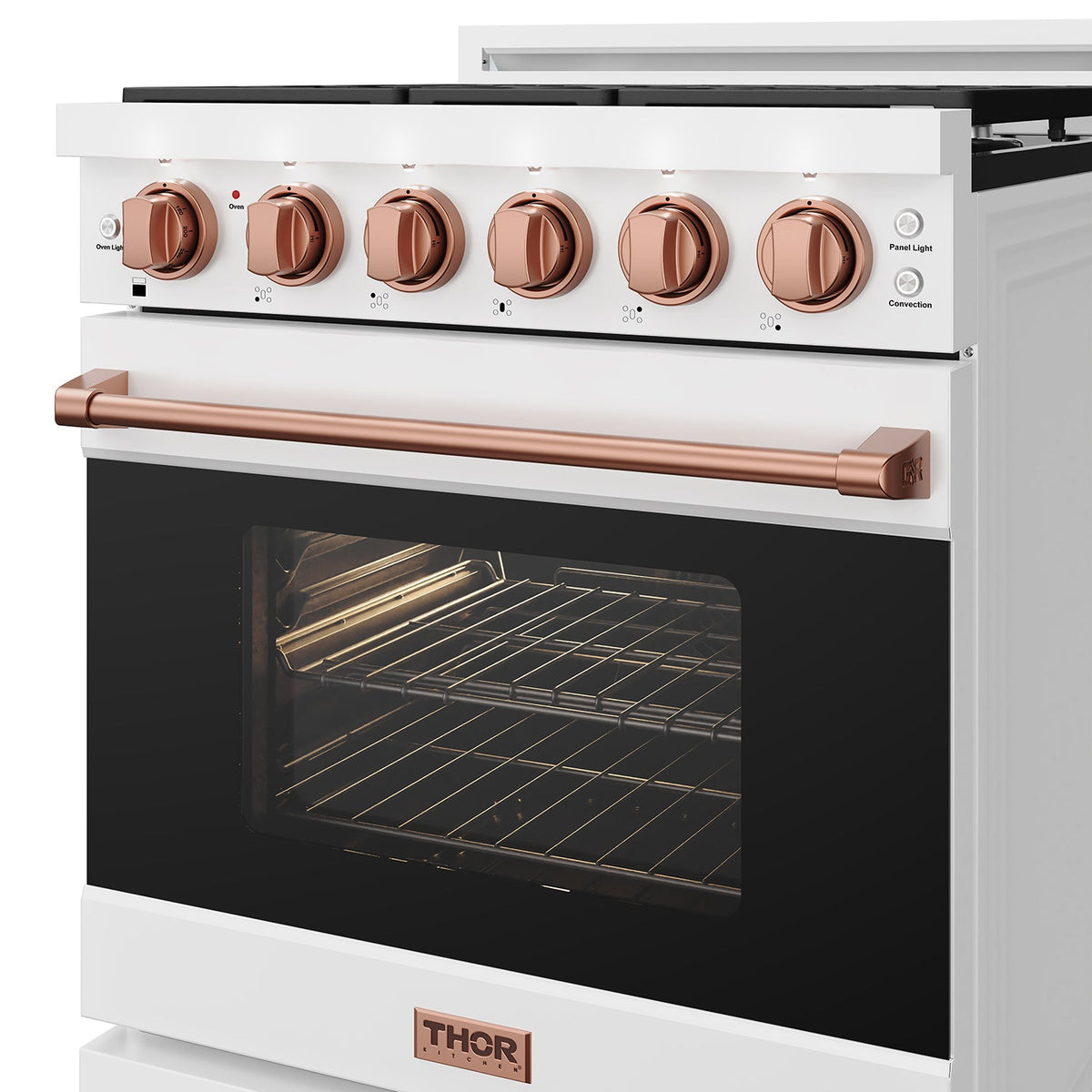 White 30-inch professional gas range with rose gold hardware, close-up of front door