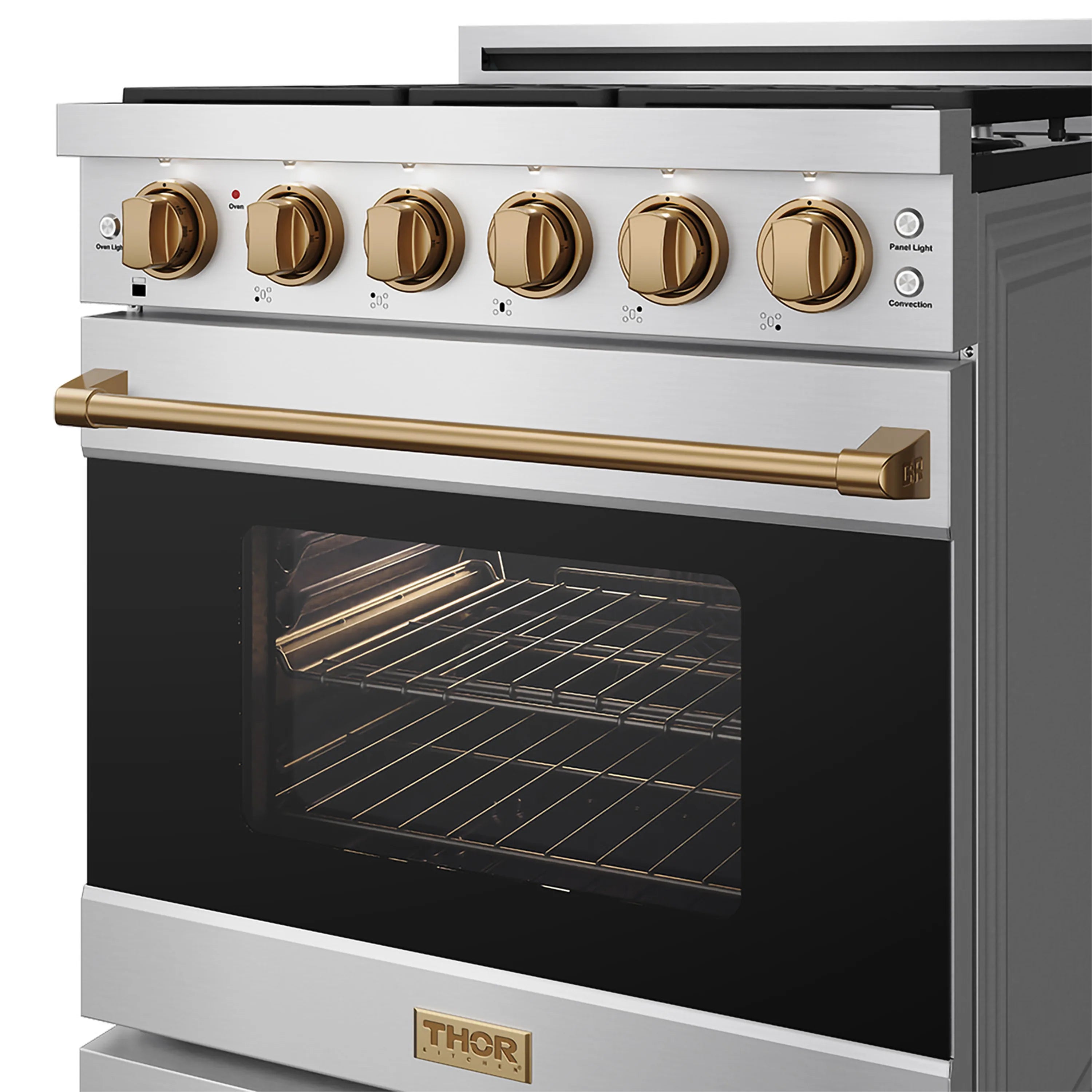 Stainless steel 30-inch gas range with bronze trim and open oven door, showing racks