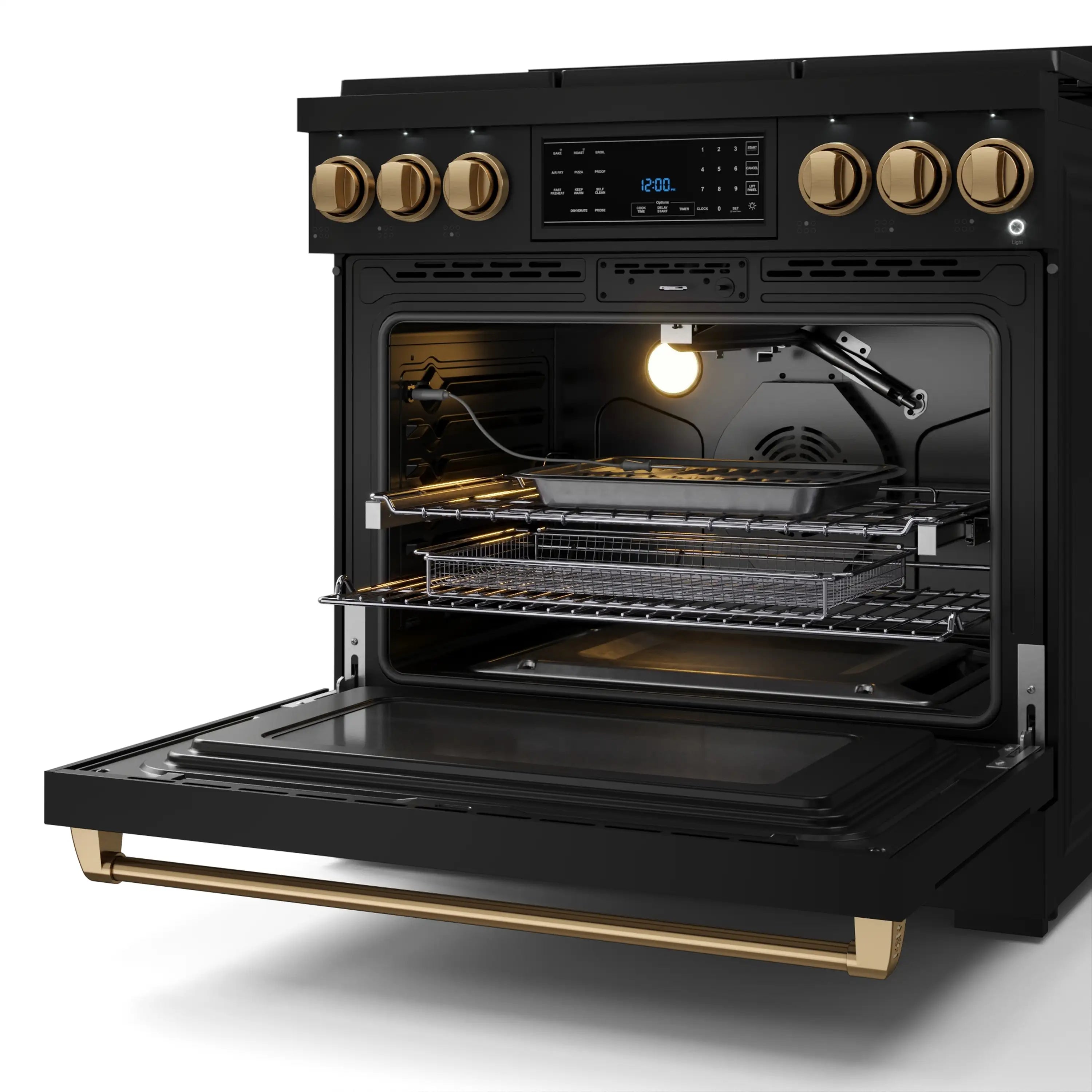Open black oven of a gas range with bronze trim, interior racks, and lighted bake area
