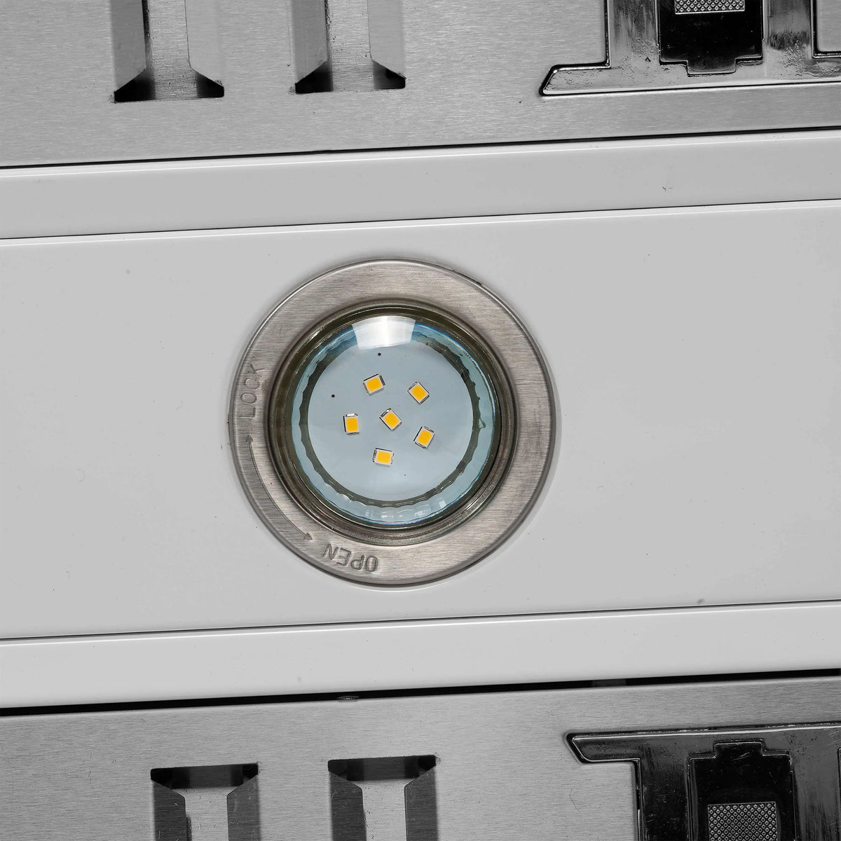 White wall mount range hood LED light module with circular bezel