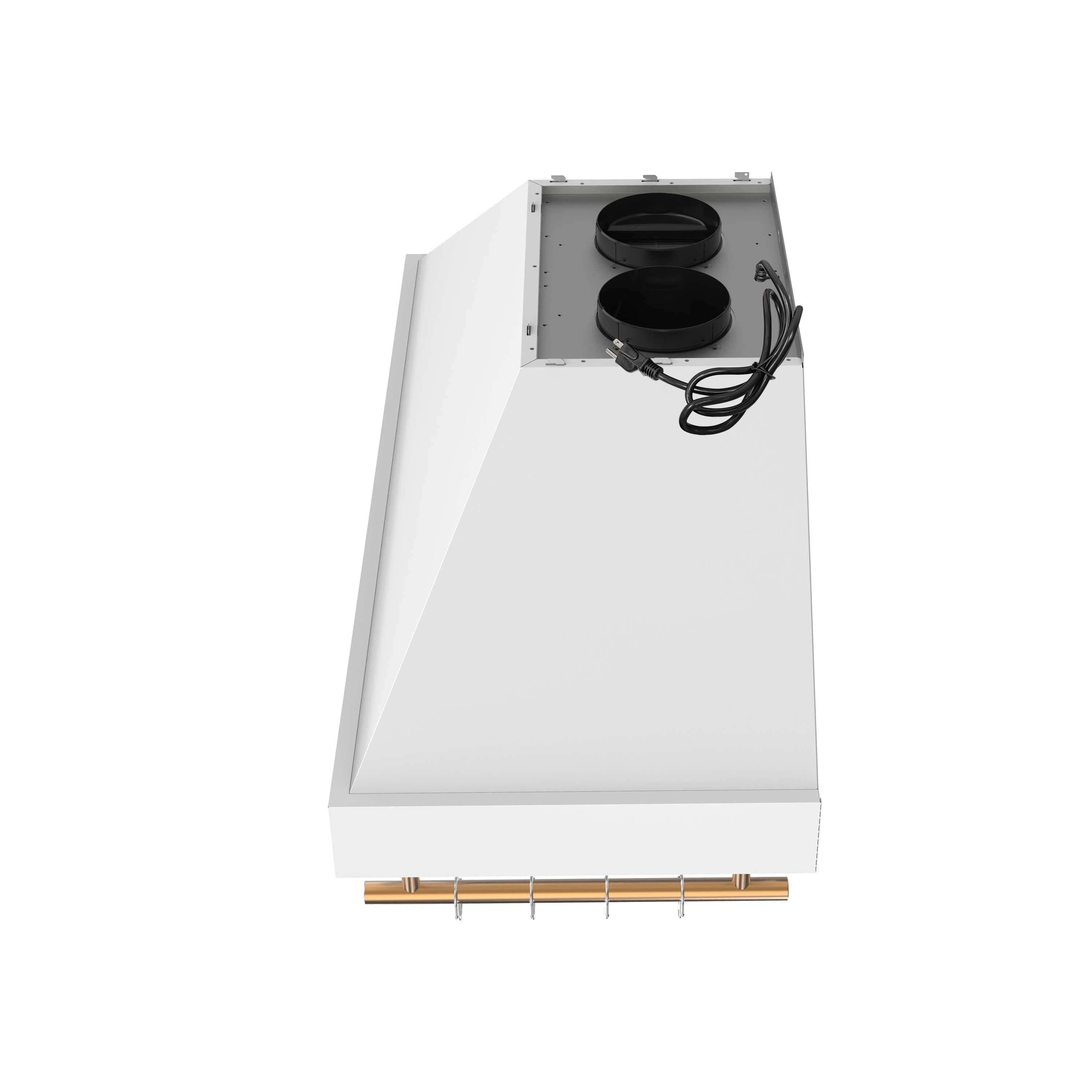 White range hood underside with two round fan motors and brass handle rail
