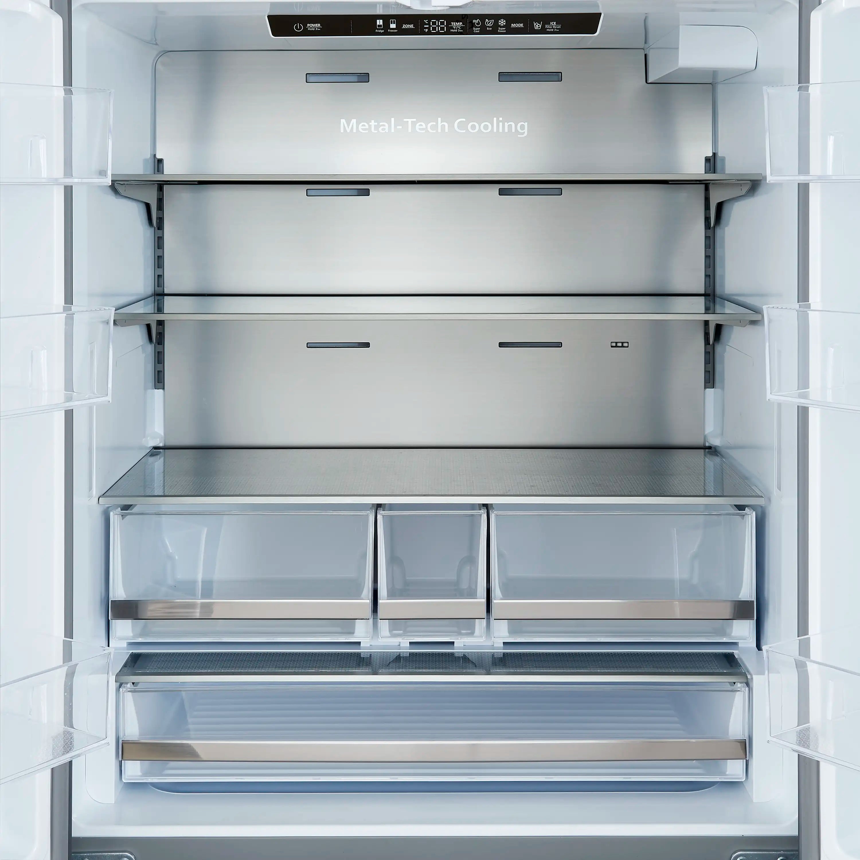 Open refrigerator interior with fixed glass shelves and pull-out freezer drawers