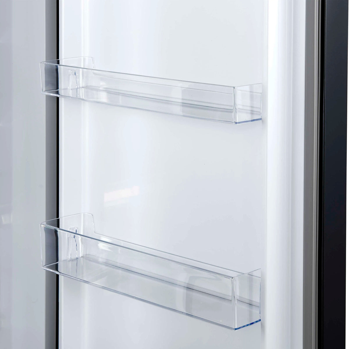 Built-in convertible refrigerator/freezer door interior with two clear storage shelves