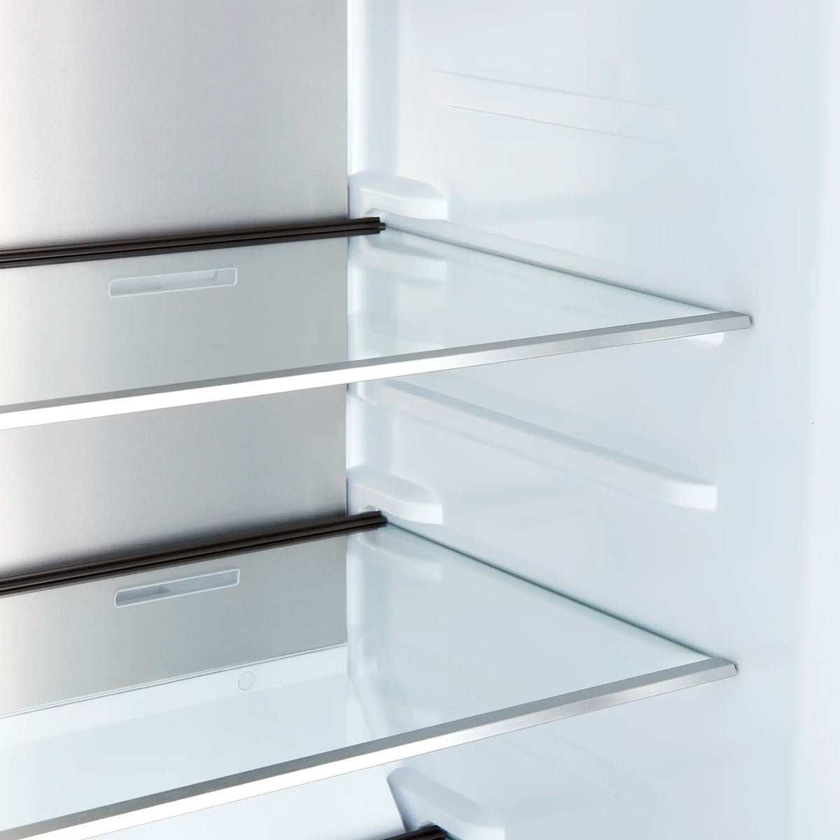 White interior shelves with clear glass and supports inside an upright freezer/refrigerator