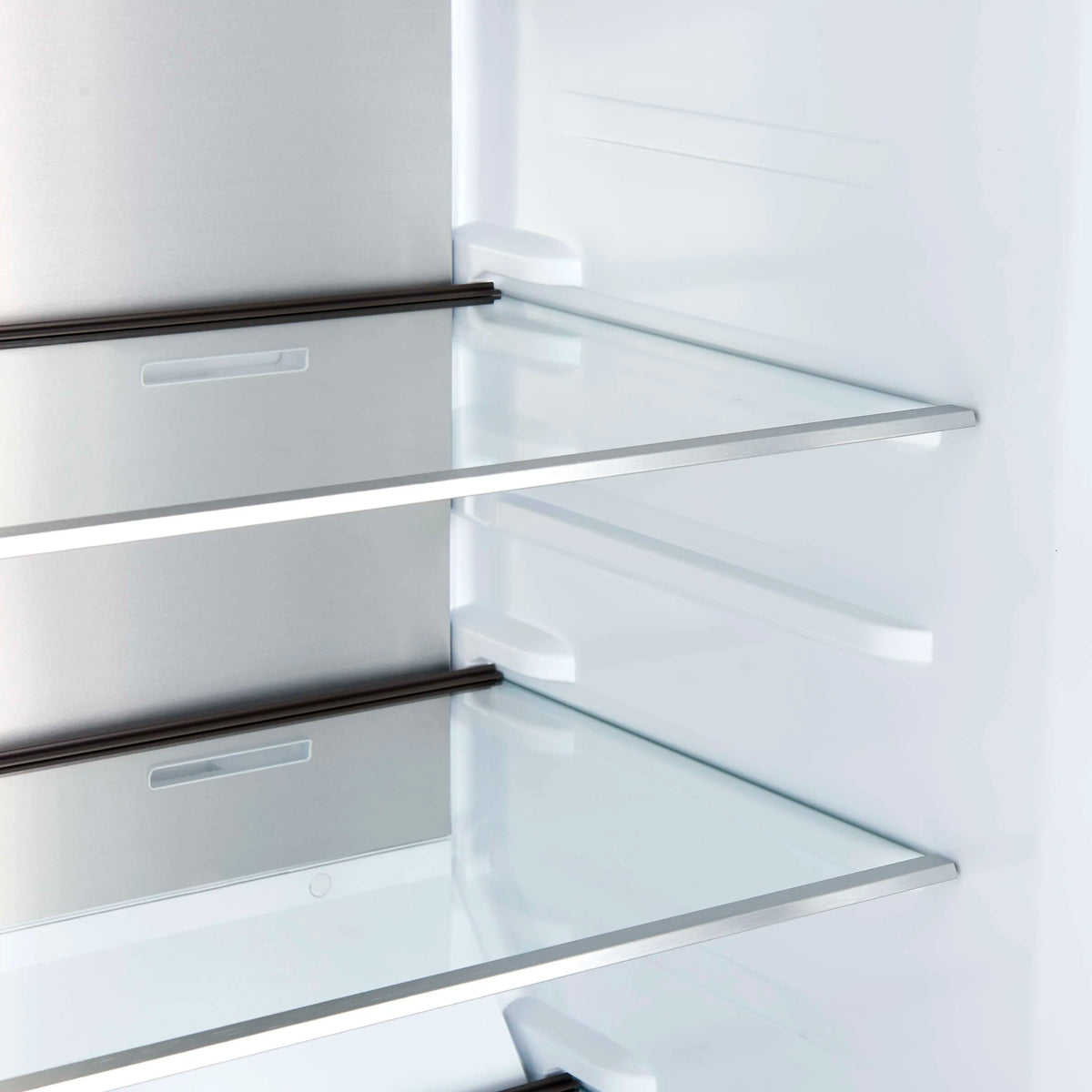 Built-in convertible refrigerator/freezer door with glass shelves and bottle bin