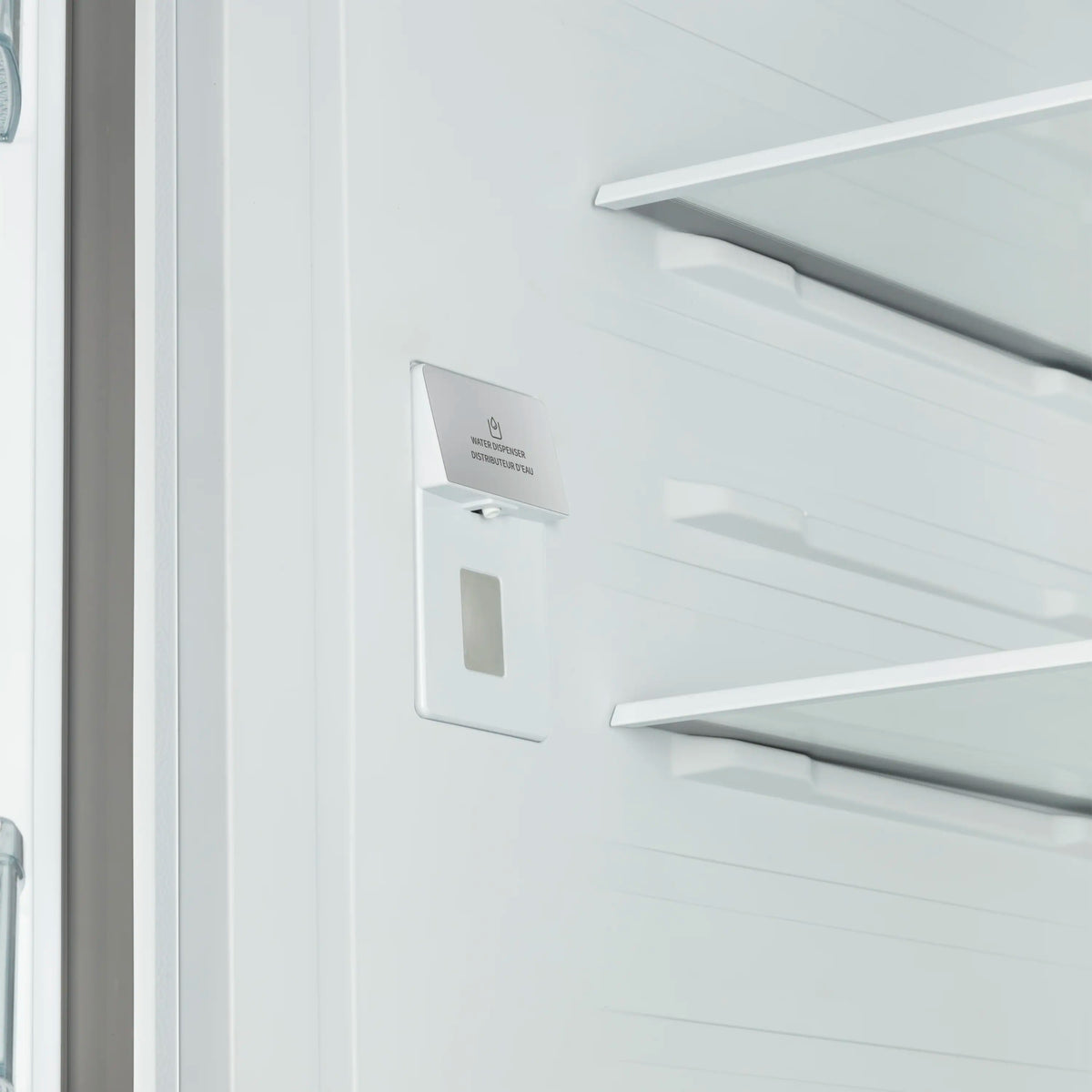 White French door refrigerator with internal water dispenser and stainless handle