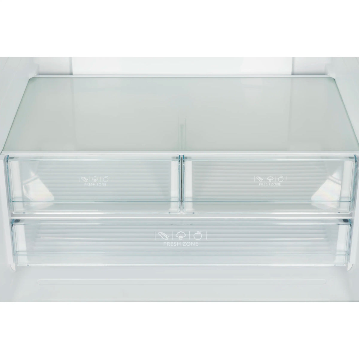 White refrigerator interior with clear glass shelves and center divider