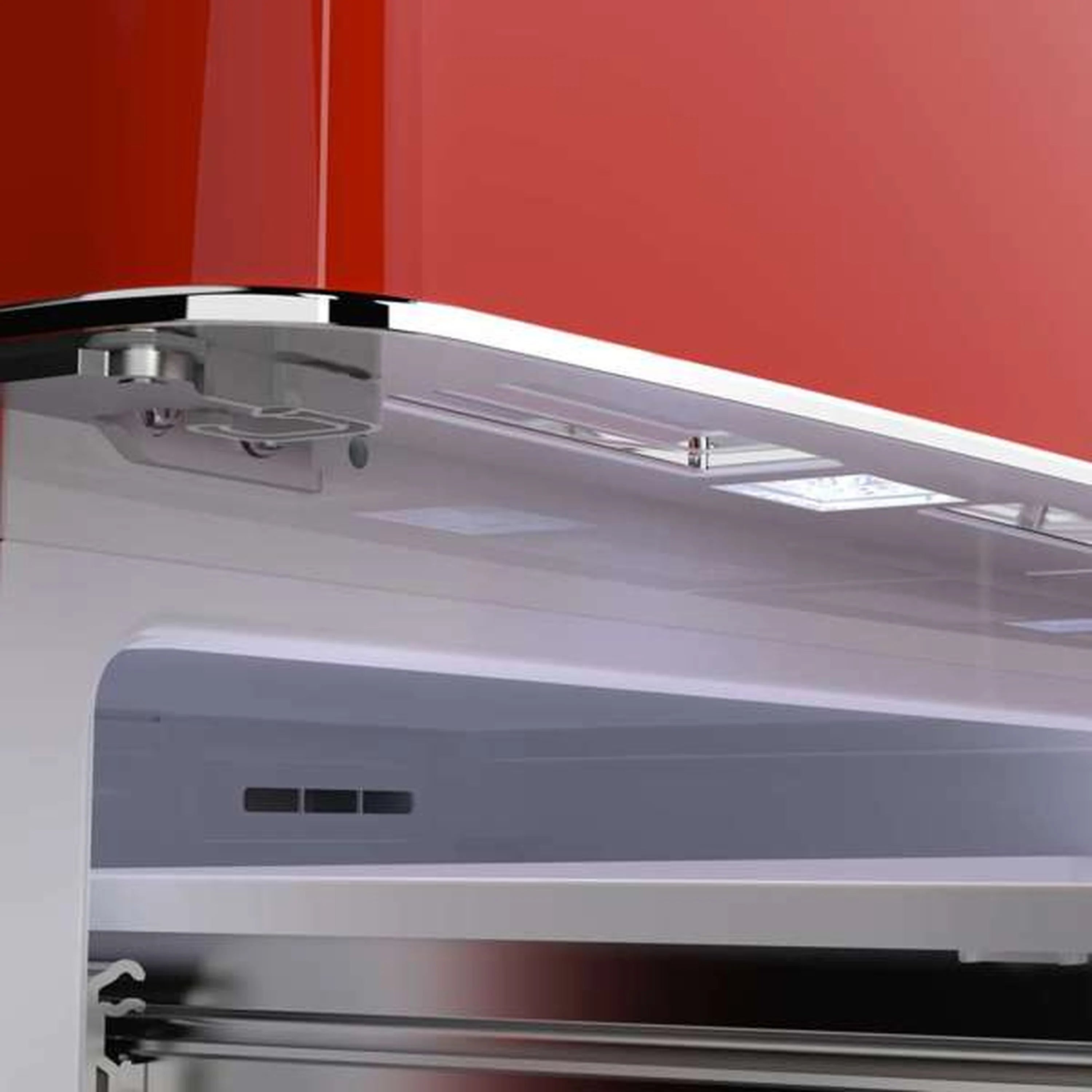 Refrigerator top interior panel with vents and white storage shelf surface.