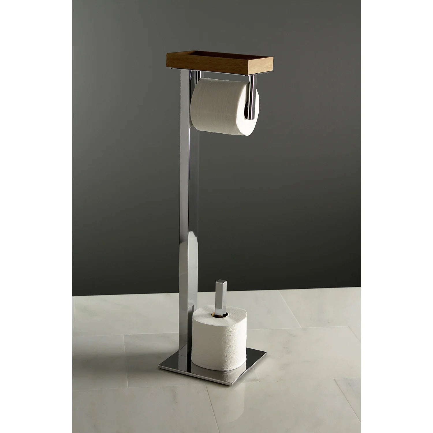 Freestanding toilet paper holder with polished chrome base, wood shelf, and toilet paper roll