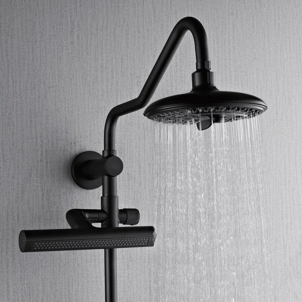 Matte black overhead rainfall shower head with body jets and steady water flow