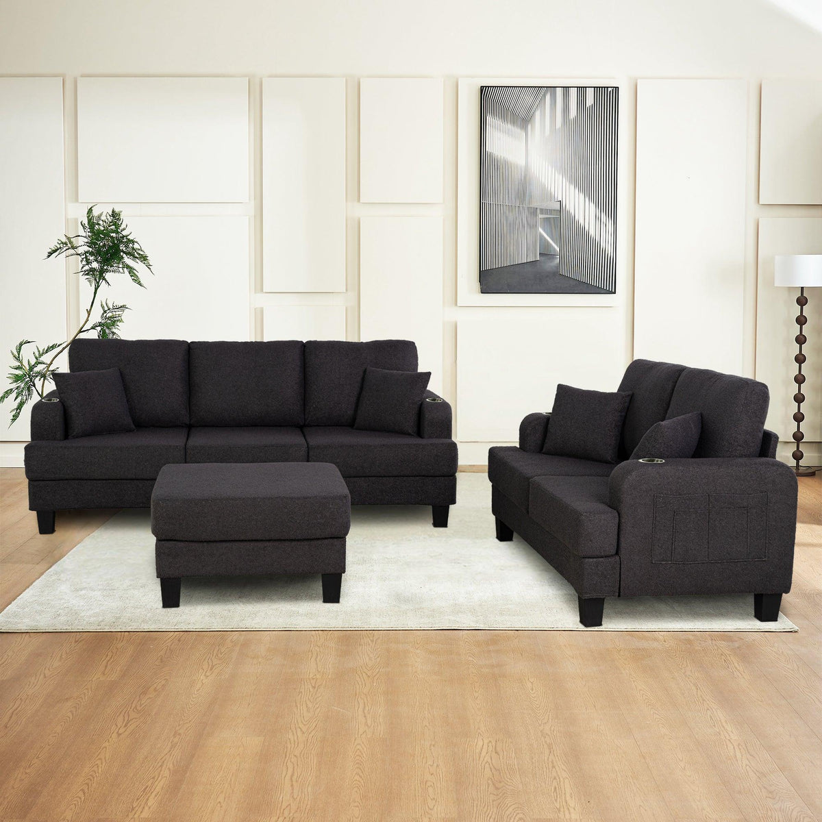 Dark gray sofa set with storage ottoman, loveseat, and matching armchair-style seats