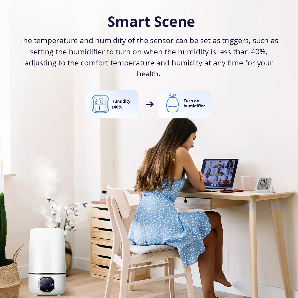 White LCD smart temperature and humidity sensor on tabletop beside child and laptop