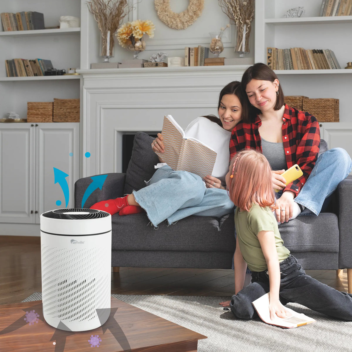 White tabletop air purifier style unit with airflow icons in living room