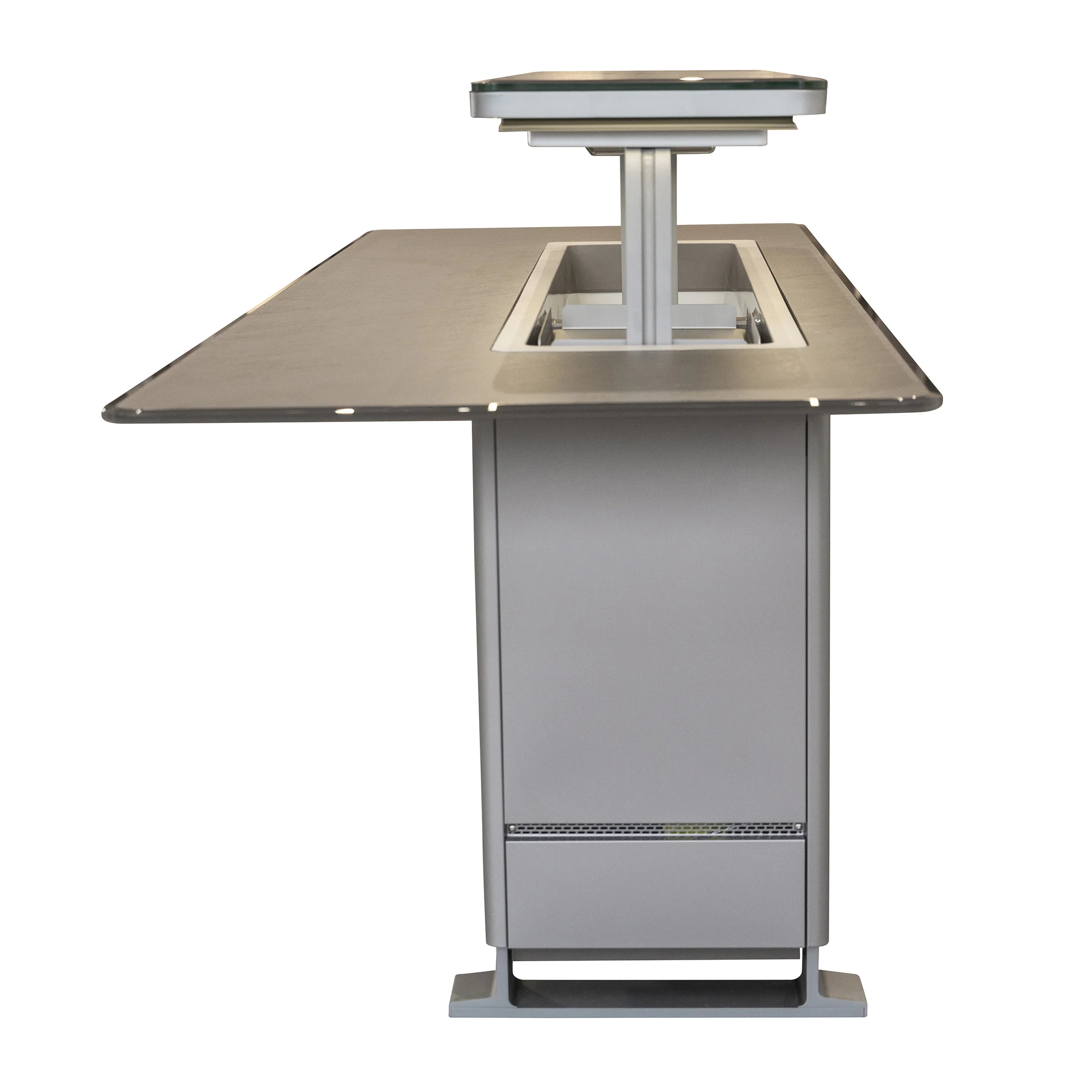 Smart bar table with open lid exposing recessed food storage space