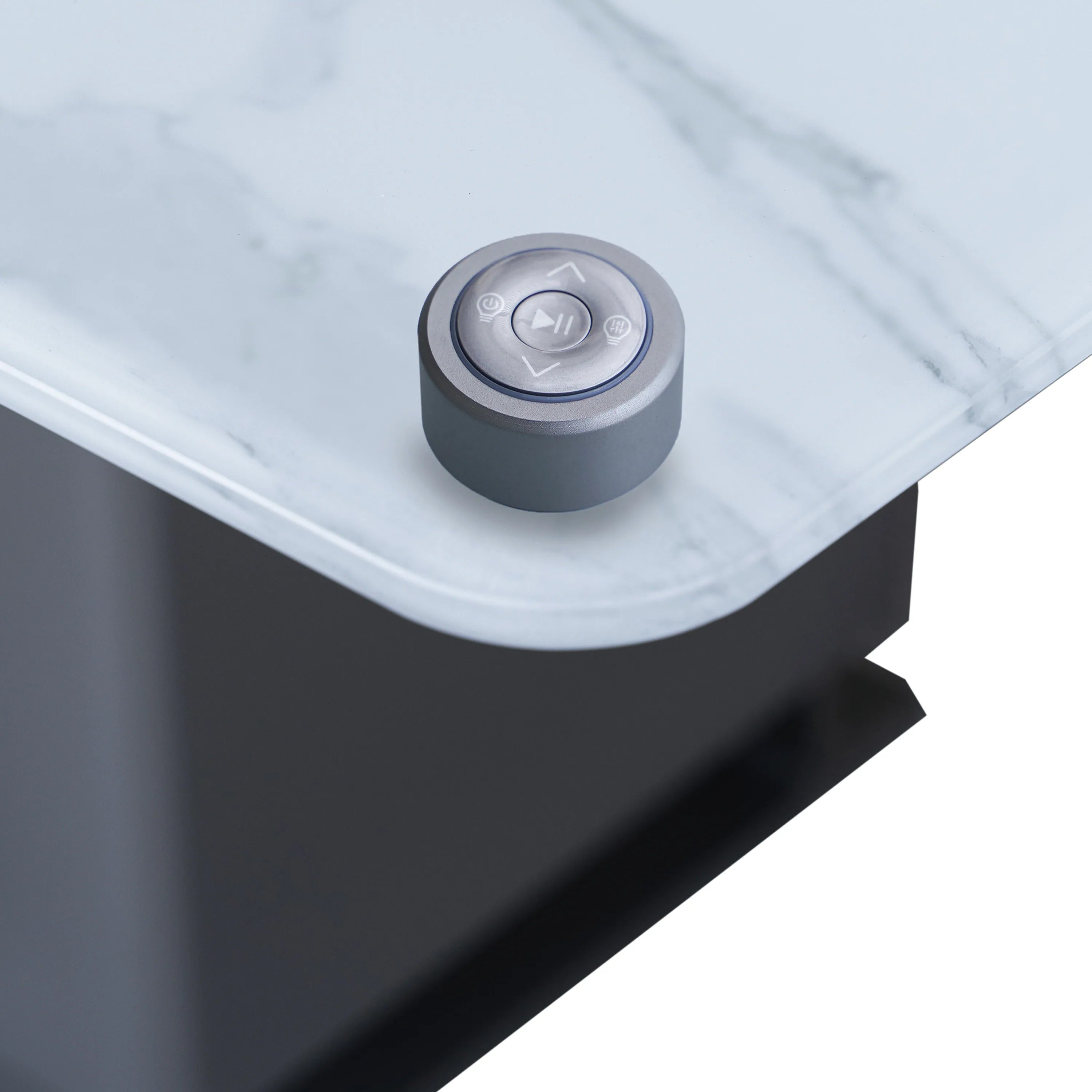 Smart dining table touch control dial on marble-look white top with icons