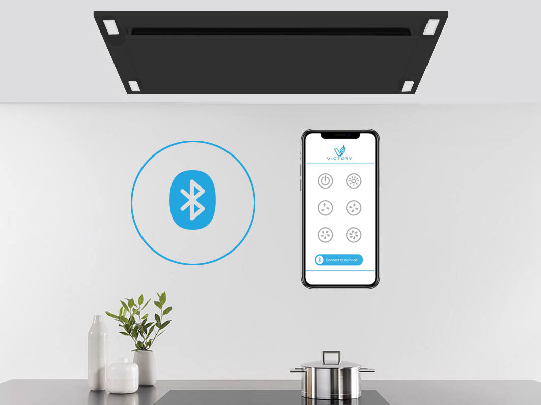 Matte black flush mount ceiling range hood with flat underside and wireless remote