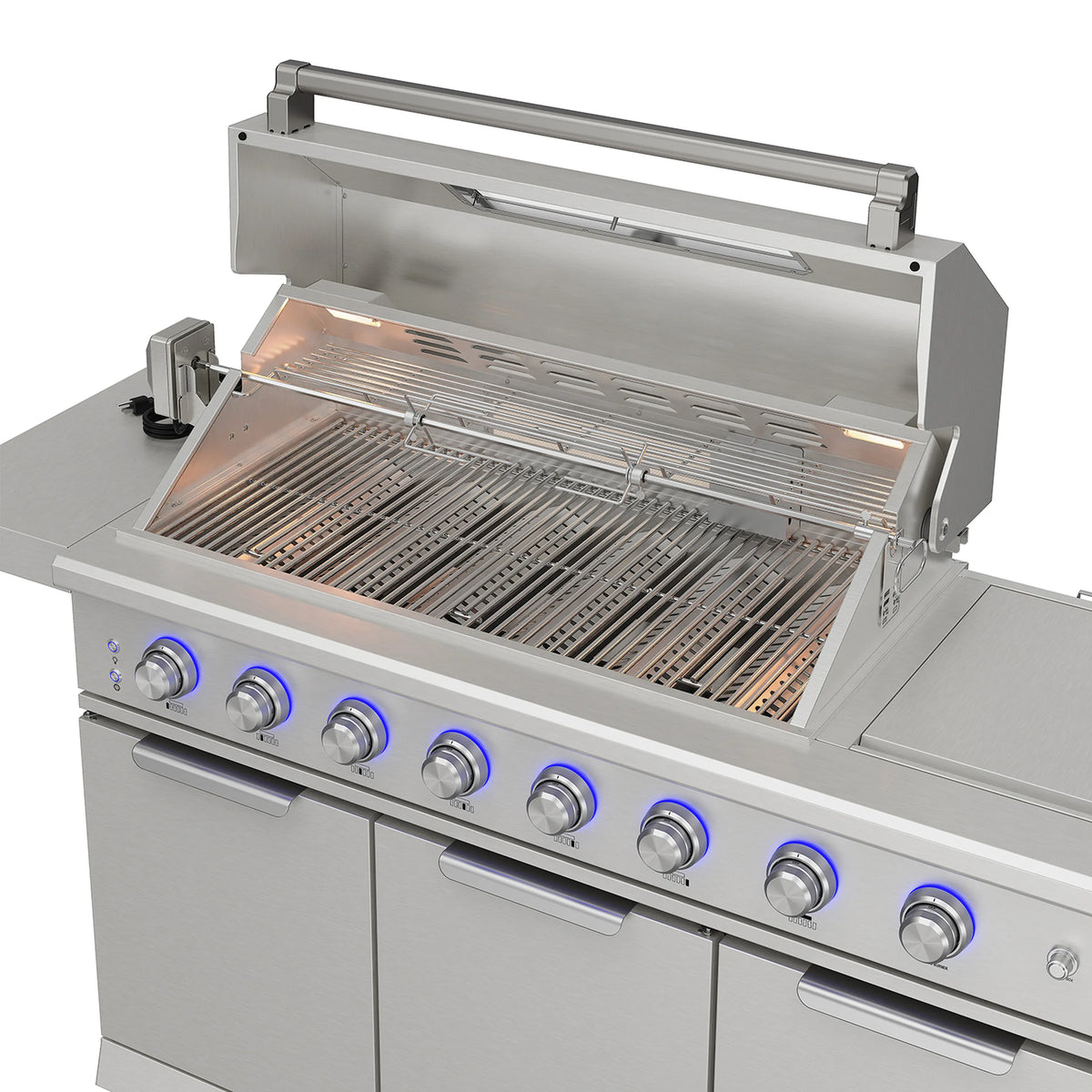Open stainless gas grill with warming racks and burner control knobs