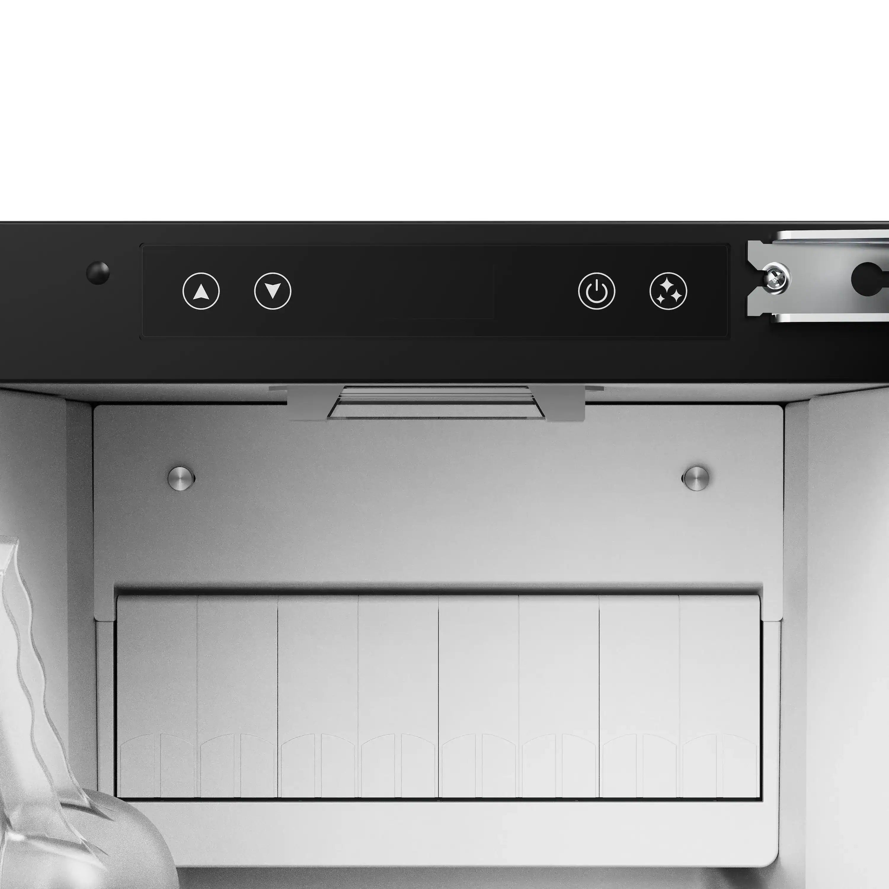 Ice maker control panel with button icons above the ice bin opening