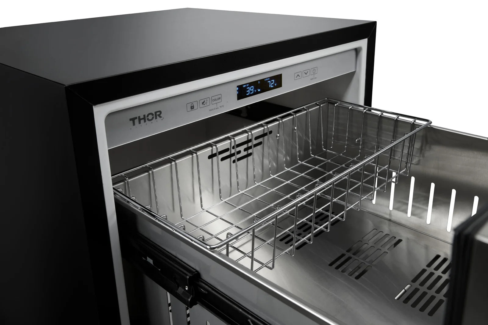 Stainless steel grill door open, showing interior racks and control panel display