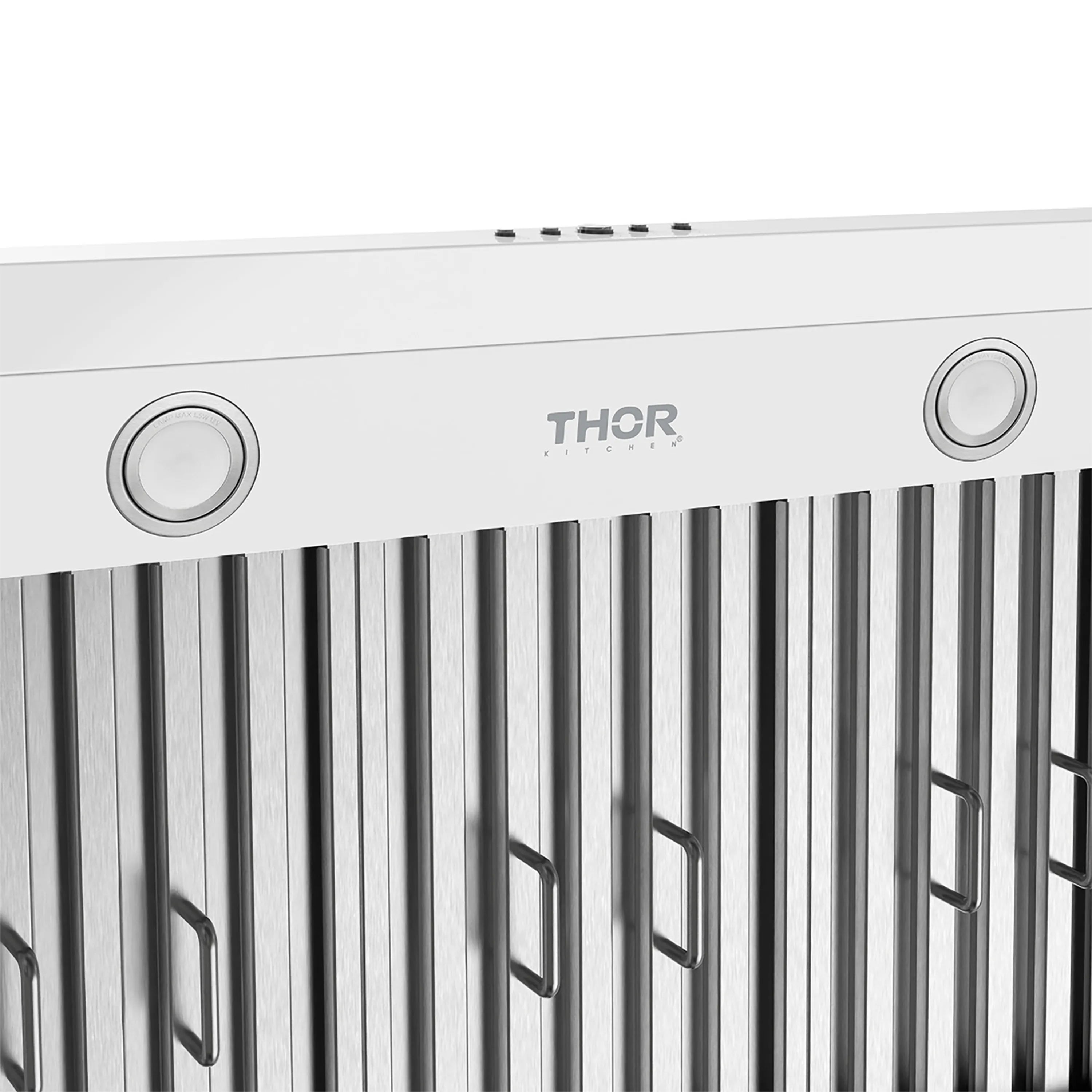 White range hood front panel with THOR logo and stainless baffle filter blades.