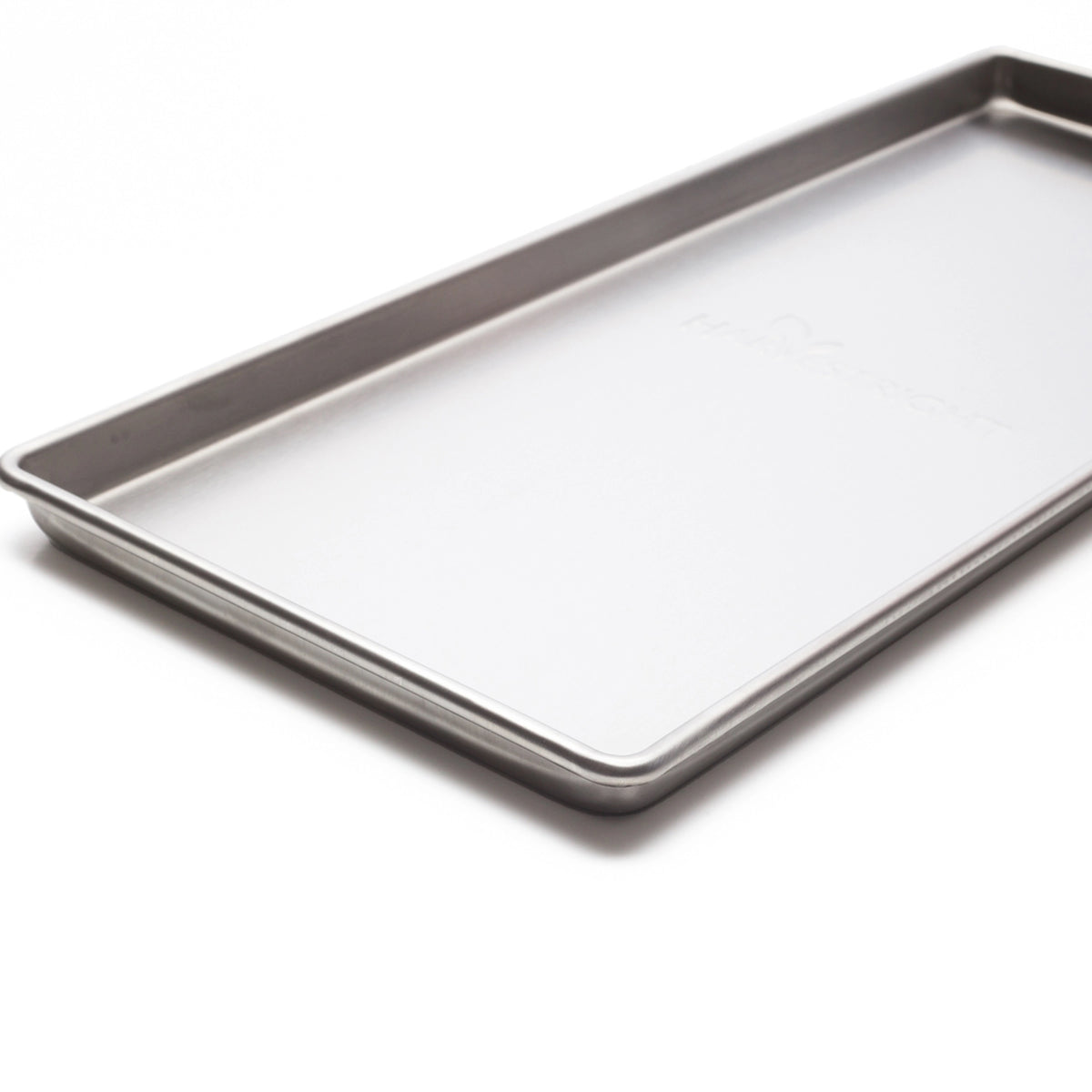 Rectangular freeze dryer tray with clear white interior and metal border