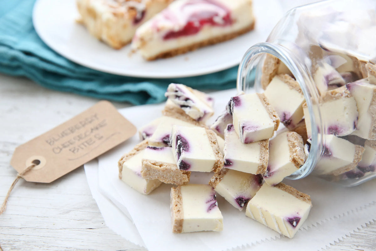 Freeze-dried snack cubes on a plate with an open container jar nearby