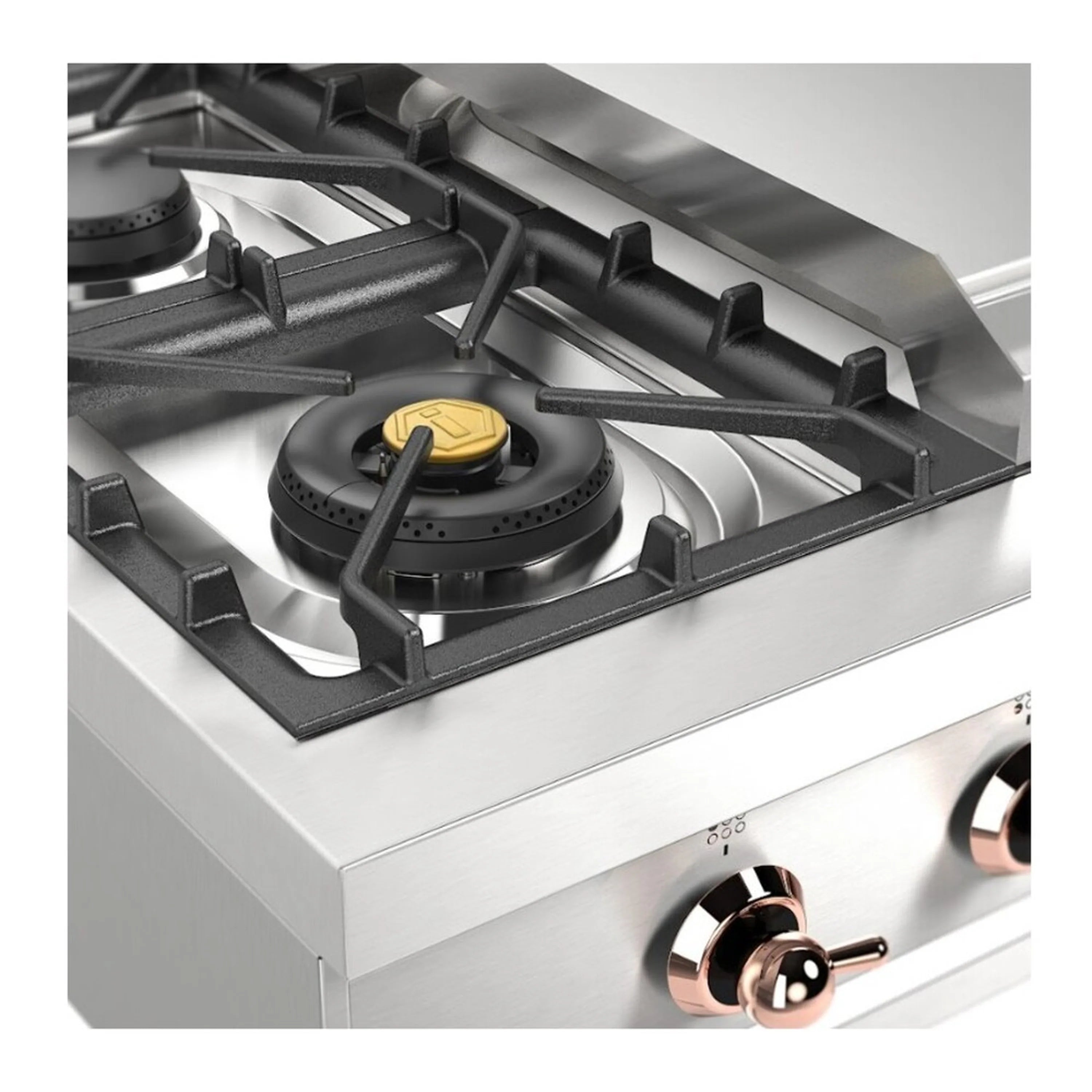 Close-up of burner and griddle on built-in gas rangetop with black burner grates