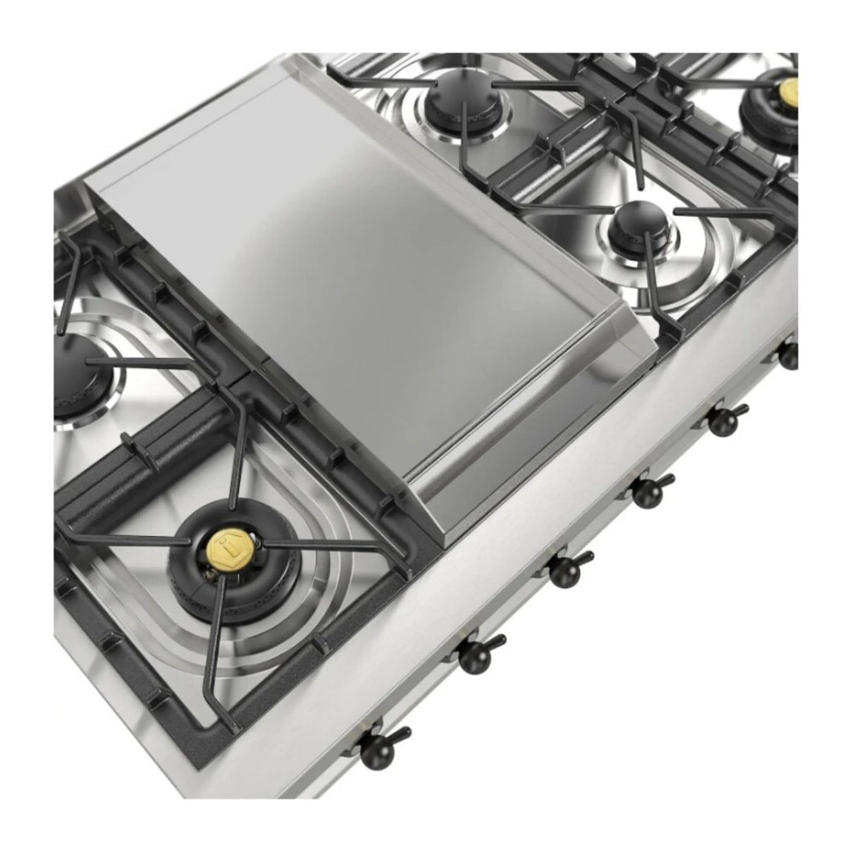 Stainless steel griddle with raised edges on gas rangetop, close-up