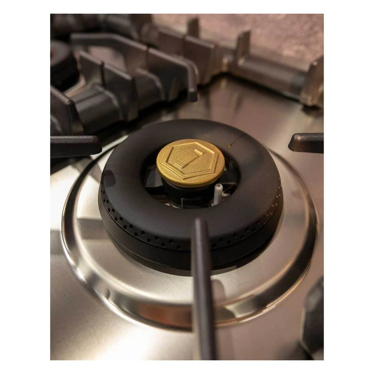 Stainless steel 5-burner gas cooktop with black burner cap and cross grate
