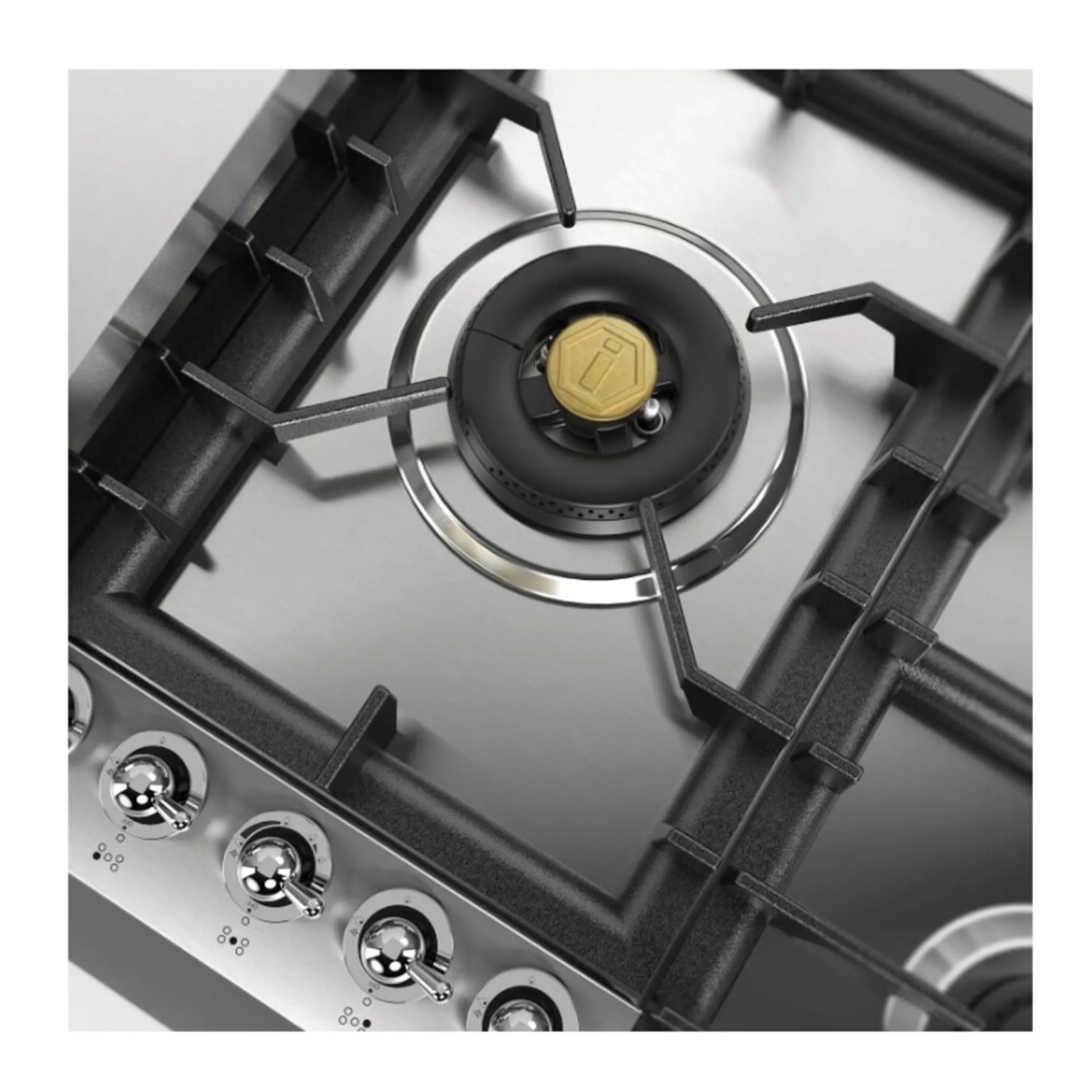 Close-up of black burner cap with cross grate supports and stainless cooktop controls