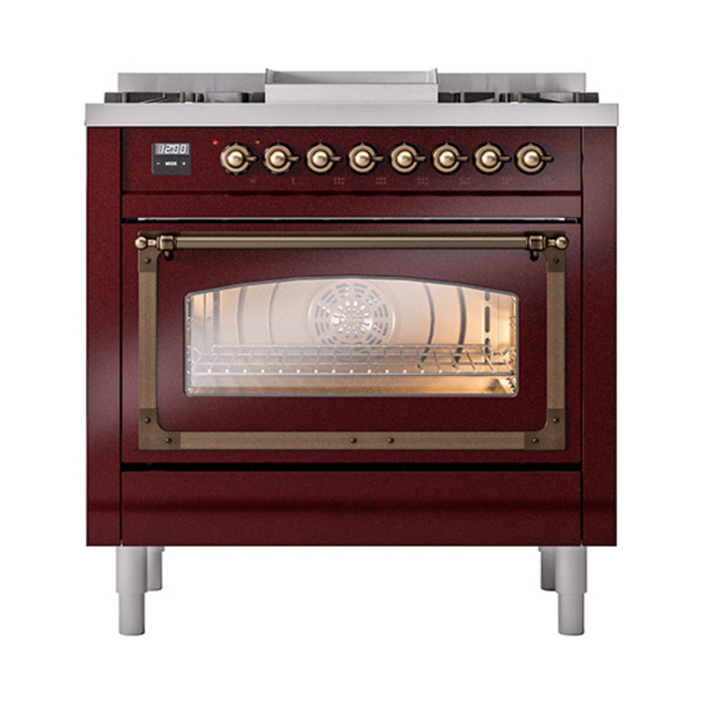 Burgundy dual fuel range with lit oven window, burner knobs, and bronze trim