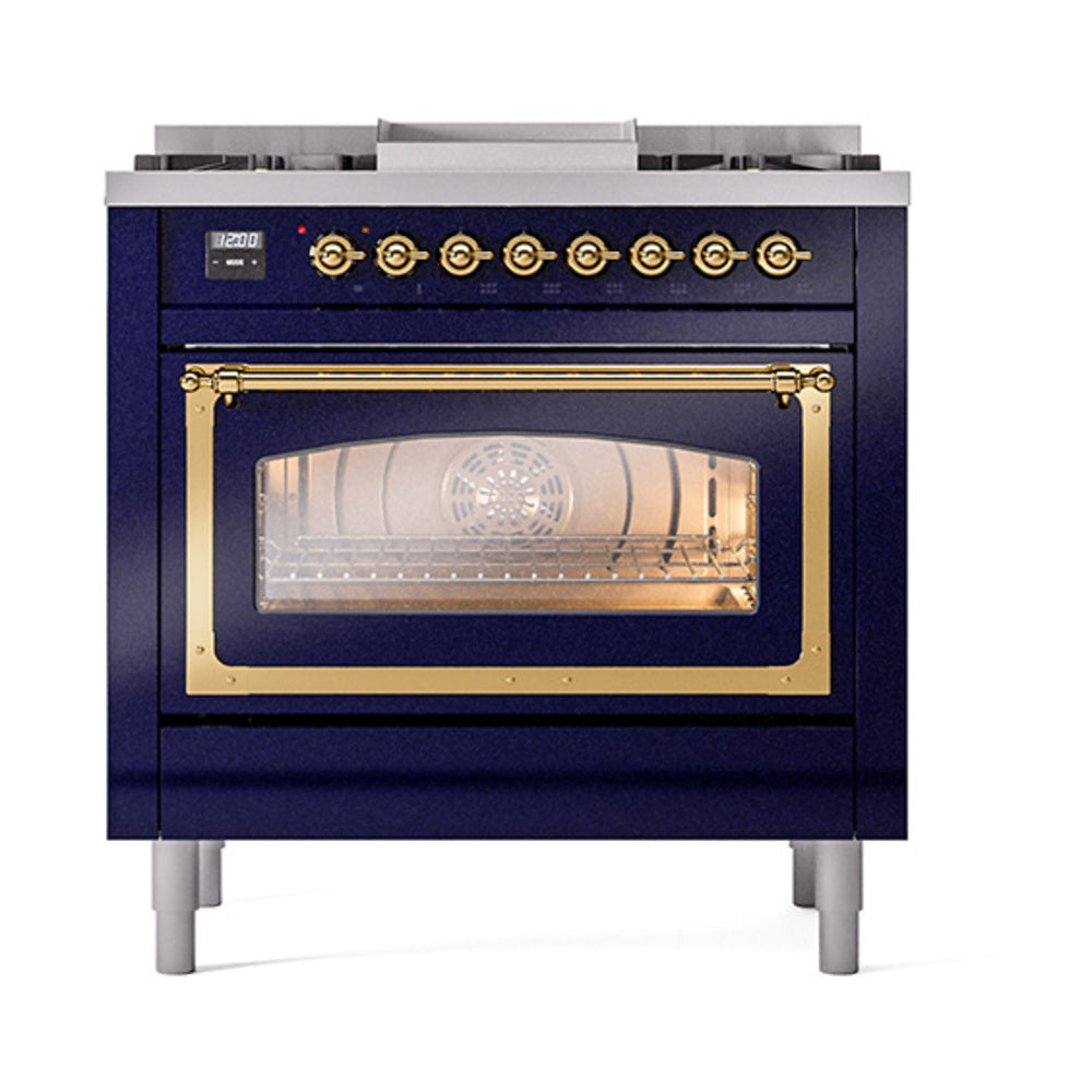 Midnight blue oven door with brass handle and lit interior triple glass panel