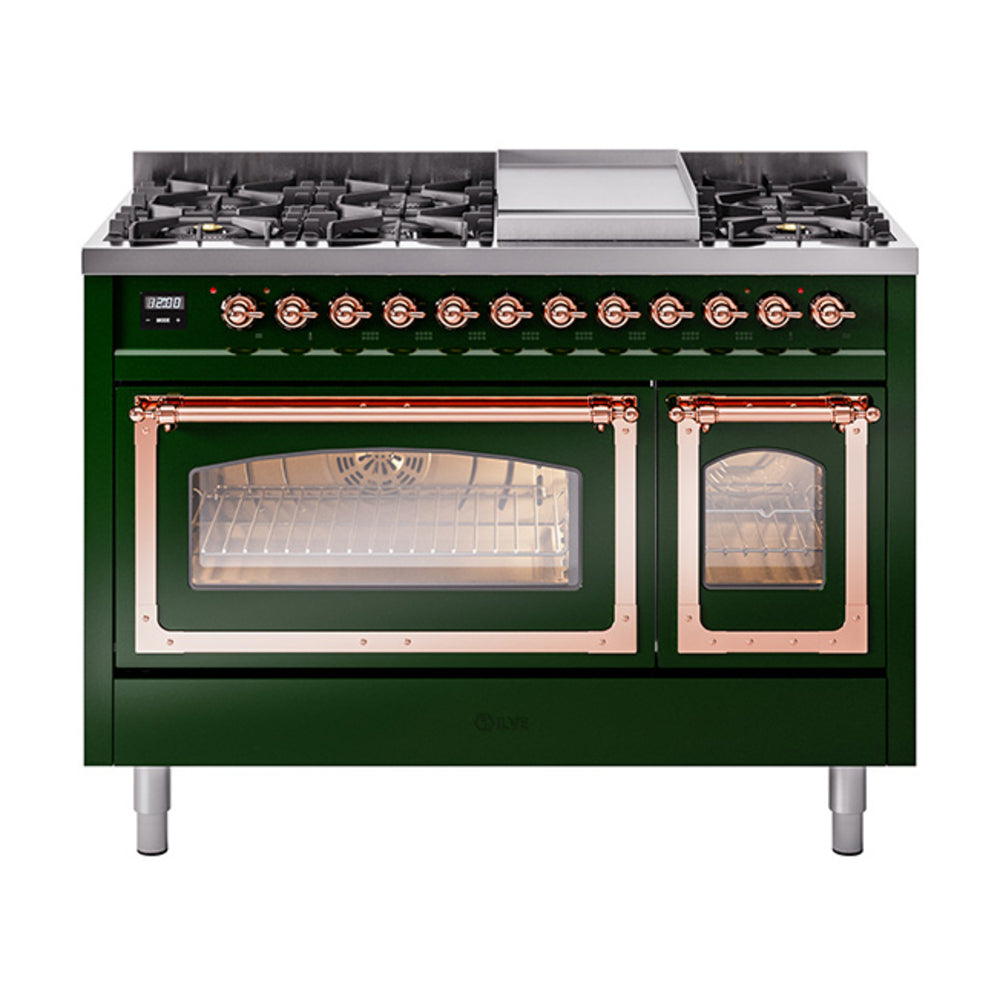 Freestanding emerald green dual fuel range with copper trim, grates, and closed oven doors