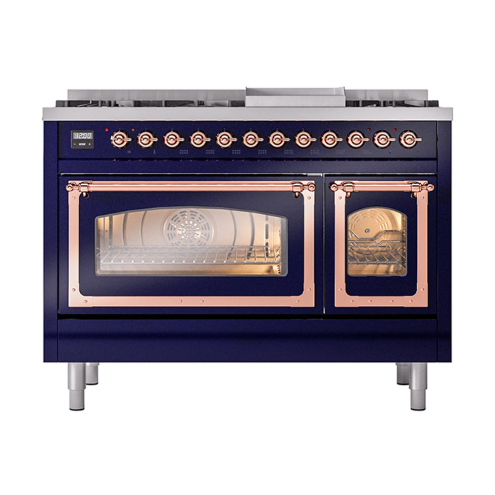 Freestanding gas dual fuel range with midnight blue body, copper trim, and lit oven