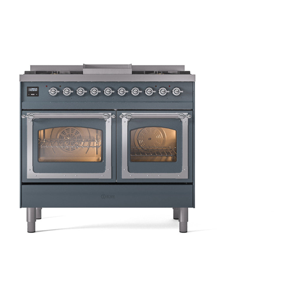 Blue grey dual fuel range with two lit ovens behind glass doors and chrome trim
