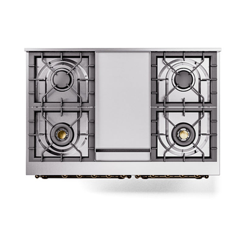 Built-in gas cooktop with four cast-iron grates and central panel on a dual fuel range