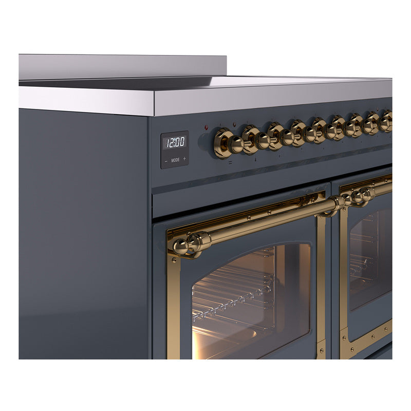 Blue grey induction range control knobs and brass oven handle with glass door