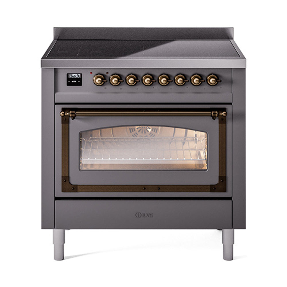 Matte graphite induction range with open triple-glass door and bronze-trim handle