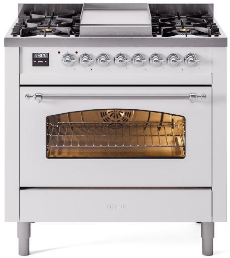 White freestanding dual fuel range with top grates and lit oven window